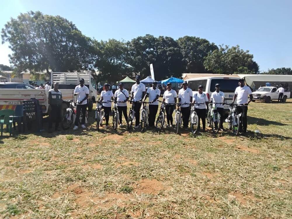 Farm staff with newly issued bicycles