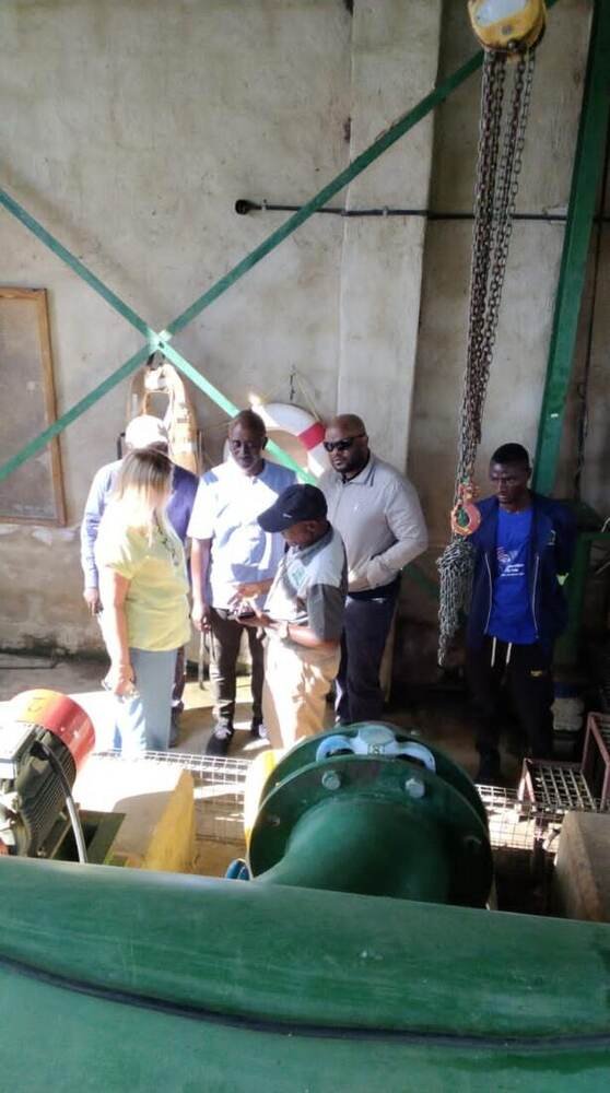 Farm manager John Machayi briefing World Bank delegates at the pump station